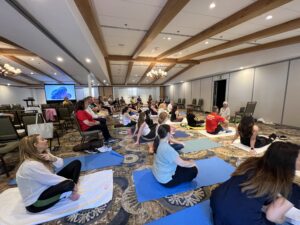 attendees doing yoga