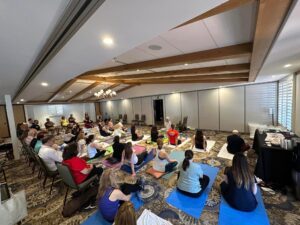 attendees doing yoga