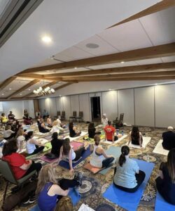 attendees doing yoga